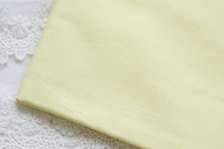 Ferdig stivnet bomullsstoff – perfekt til stoffblomster - pastelgul